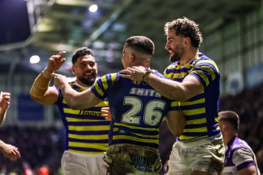 Warrington Wolves takımından Josh Smith, 28 Şubat 2026 'da İngiltere' nin Warrington kentinde oynanan Betfred Süper Lig 3. Raundunda Warrington Wolves vs Wakefield Trinity maçında denemesini kutluyor.