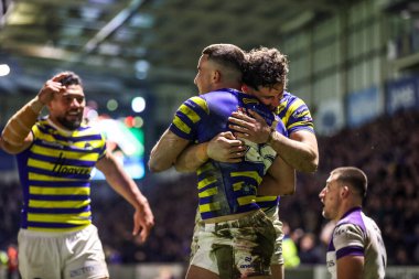 Warrington Wolves takımından Josh Smith, 28 Şubat 2026 'da İngiltere' nin Warrington kentinde oynanan Betfred Süper Lig 3. Raundunda Warrington Wolves vs Wakefield Trinity maçında denemesini kutluyor.