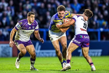 Warrington Wolves 'tan Liam Byrne, 28 Şubat 2026' da İngiltere 'nin Warrington kentinde oynanan Betfred Süper Lig karşılaşmasında Wakefield Trinity' den Tyson Smoothy tarafından yenildi.