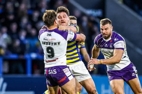 Warrington Wolves 'tan Liam Byrne, 28 Şubat 2026' da İngiltere 'nin Warrington kentinde oynanan Betfred Süper Lig karşılaşmasında Wakefield Trinity' den Tyson Smoothy tarafından yenildi.