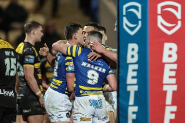 Warrington Wolves 'tan Sam Stone, 6 Mart 2026' da İngiltere 'nin başkenti York' ta oynanan Betfred Süper Lig 4. tur karşılaşmasında şansını kutluyor.
