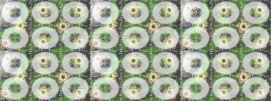 Yeşil, gri ve nötr renklerde çiçekler. Kumaş desenli papatya çiçekleri ayrıntıları.