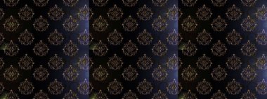 Kumaş desenli papatya çiçeği detayı. Siyah, gri ve kahverengi renkte çiçekler.