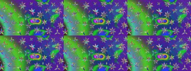 Kumaş desenli papatya çiçeği detayı. Yeşil ve mavi renkte çiçekler.