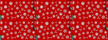 Kırmızı ve nötr renklerde parlak çiçekli halı deseni.