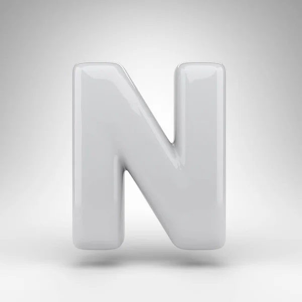 Brief N hoofdletters op witte achtergrond. Witte plastic 3D letter met glanzend oppervlak. — Stockfoto
