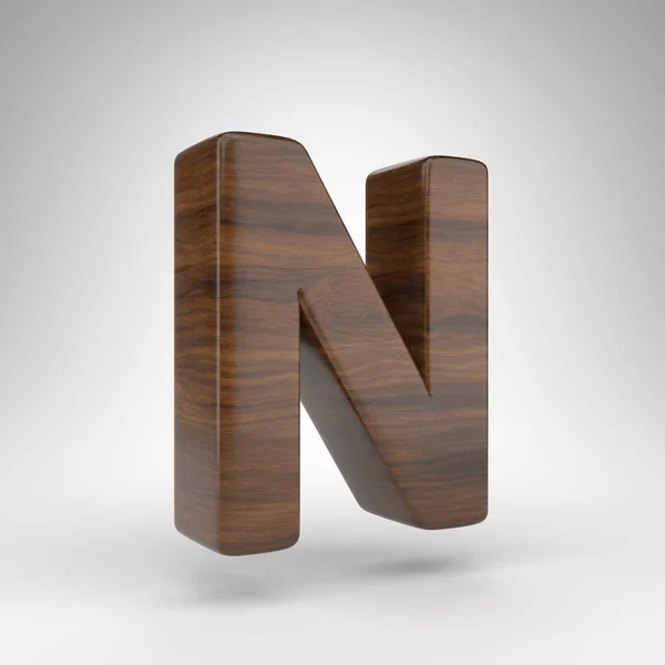 Lettera N maiuscola su sfondo bianco. Lettere 3D in rovere scuro con texture in legno marrone. — Foto Stock