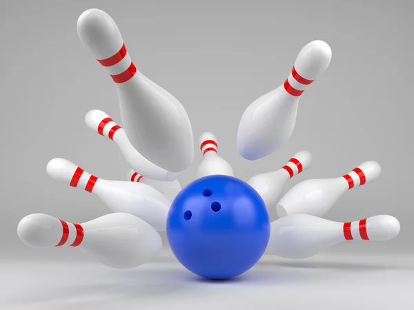 Blå bowlingklot och spridda käglor — Stockfoto