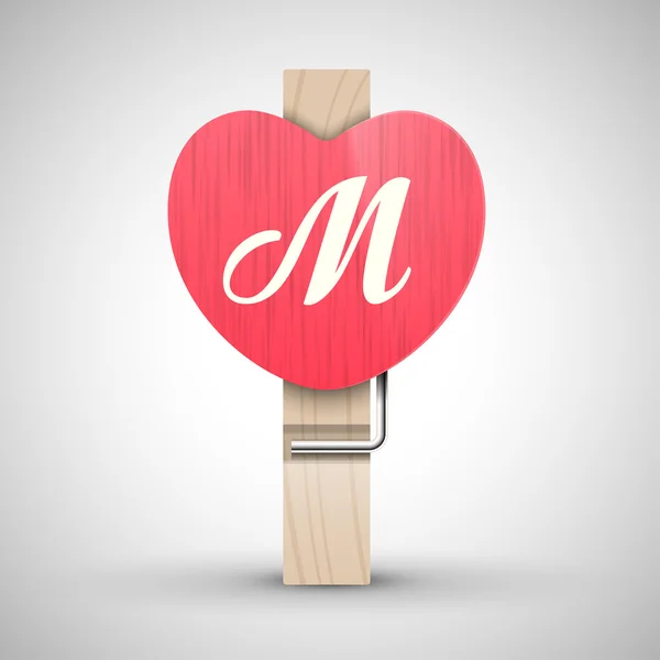 Clothes heart pin with letter M — Stock Vector