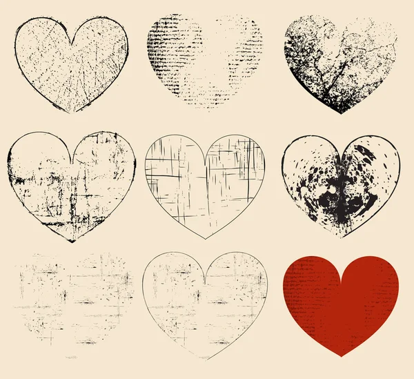 Набор гранж-сердец — стоковый вектор