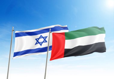 İsrail ve Birleşik Arap Emirlikleri bayrakları şafak vakti gökyüzünde dalgalanıyor