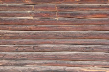 Köy eski ahşap evde. Ayrıntılı bir duvar. Günlük yıpranmış, sert yüzey. Yüksek büyütmede kesin detayları.