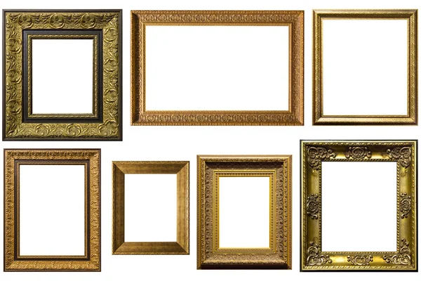 Gouden foto frames. Geïsoleerd op witte achtergrond — Stockfoto