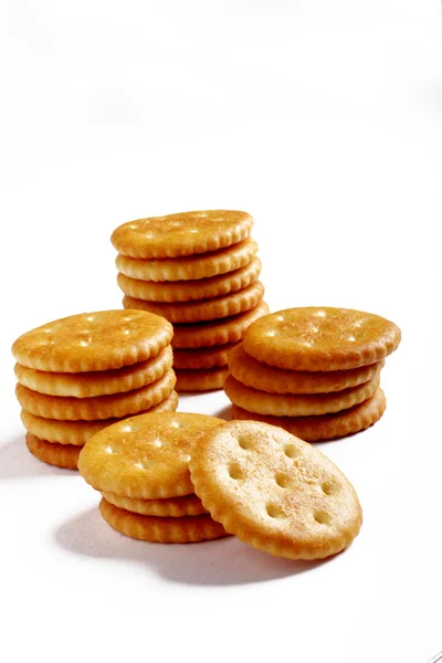 Galletas saladas sobre fondo blanco — Foto de Stock