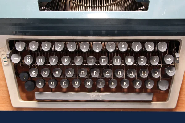 A Vintage Typewriter on a wooden table — Stock Photo, Image