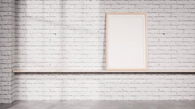 Beyaz tuğla bir duvara karşı ince bir rafa yerleştirilmiş tek bir çerçevenin yer aldığı temiz bir iç mekan. Marka sunumları, poster modelleri, ambalaj görselleri ve modern ürün pazarlama planları için idealdir..