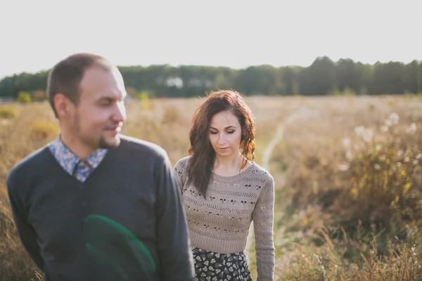 Young couple at sunset — Stock Photo, Image