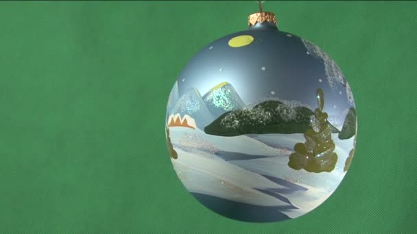 Christmas boll på en grön bakgrund — Stockvideo