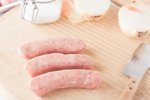 Uncooked meat sausages — Stock Photo, Image