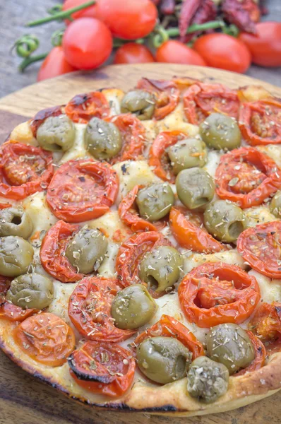 Focaccia with cherry tomatoes and green olives — Stock Photo, Image