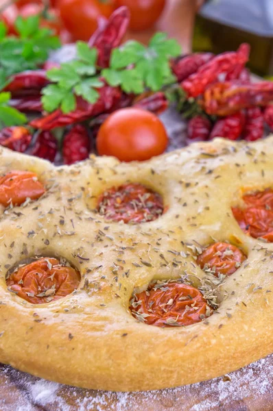 Traditional italian focaccia with cherry tomatoes — Stock Photo, Image