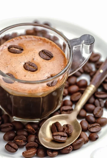 Coffee beans and coffee cup from above — Stock Photo, Image