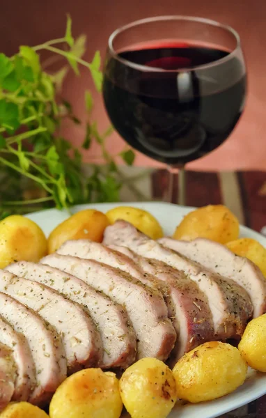 Roasted pork with roasted potatoes — Stock Photo, Image