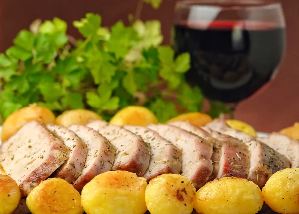 Roasted pork with roasted potatoes — Stock Photo, Image