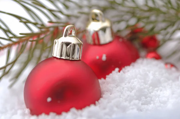 Christmas decorations in the snow — Stock Photo, Image