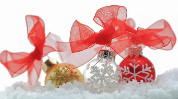 Christmas decorations in the snow — Stock Photo, Image