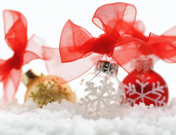 Christmas decorations in the snow — Stock Photo, Image