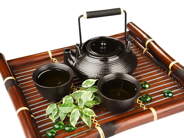 Green tea set on a bamboo mat — Stock Photo, Image