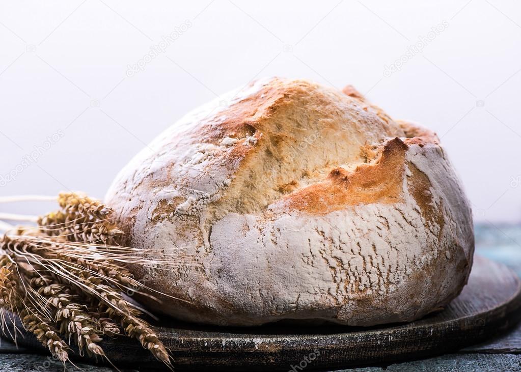 White bread on wooden background