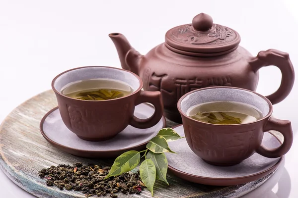 Green Tea set on a bamboo mat on white backgrond — Stock Photo, Image