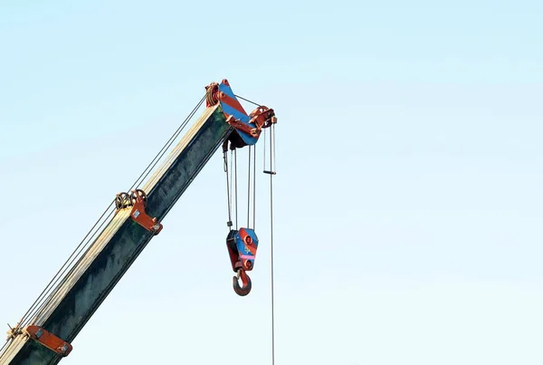 A crane car was working in a civil construction area.