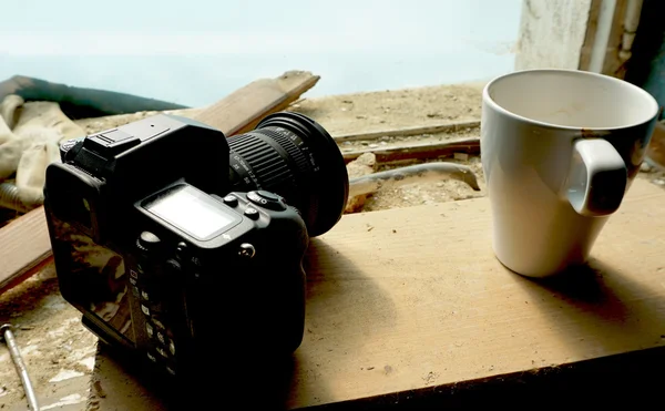 Câmera e copo — Fotografia de Stock