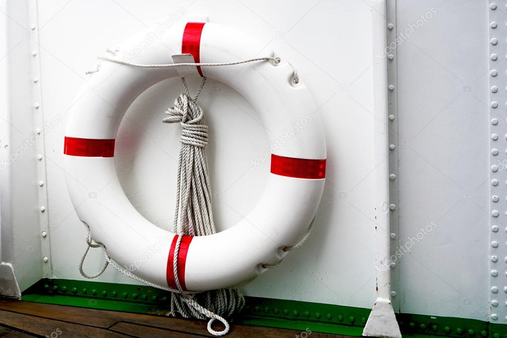 white red Lifebuoy and white ship