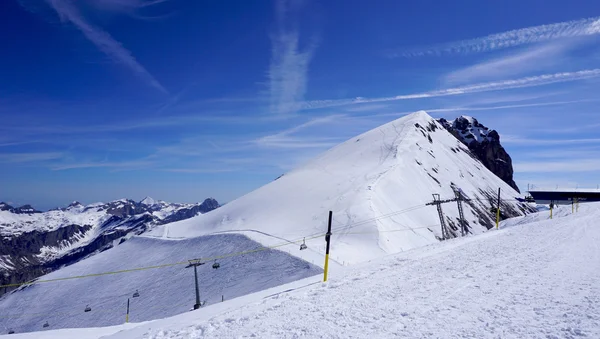 Snow mountains titlis and cable car — Stock Photo, Image