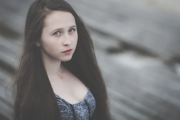 Portrait of a beautiful young sad hipster girl  outdoors — Stock Photo, Image