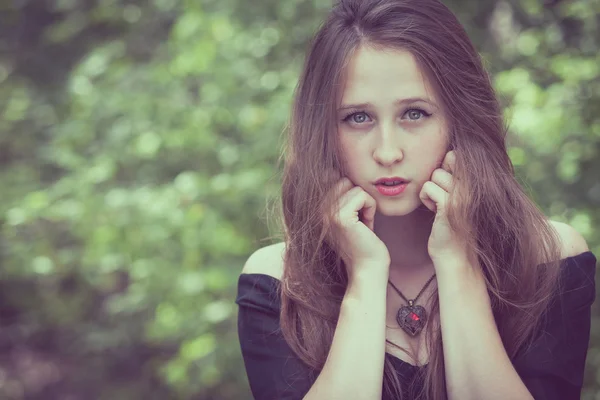 Portrait of a beautiful young sad goth girl in an abandoned old — Stock Photo, Image