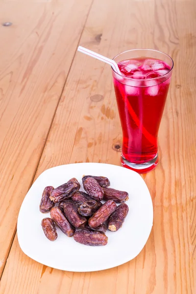 Sweet syrup, dates, simple iftar break fast food during Ramadan for Muslim