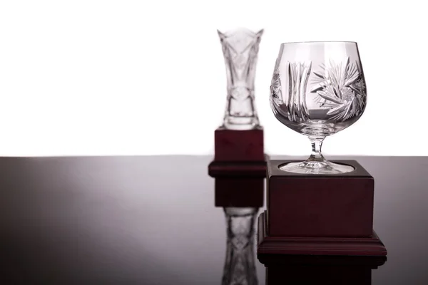 Two crystal trophies with focus on cup trophy at foreground — Stock Photo, Image