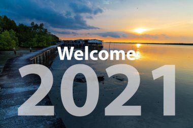 2021 'e hoş geldiniz. Malezya' da gün doğumuna karşı yazılar.