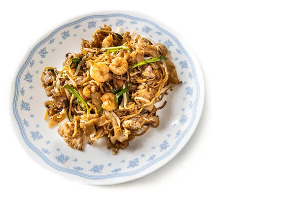 Visão aérea de Penang char kuey teow é popular macarrão frito com coceral, camarão e ovos em molho preto na Malásia — Fotografia de Stock