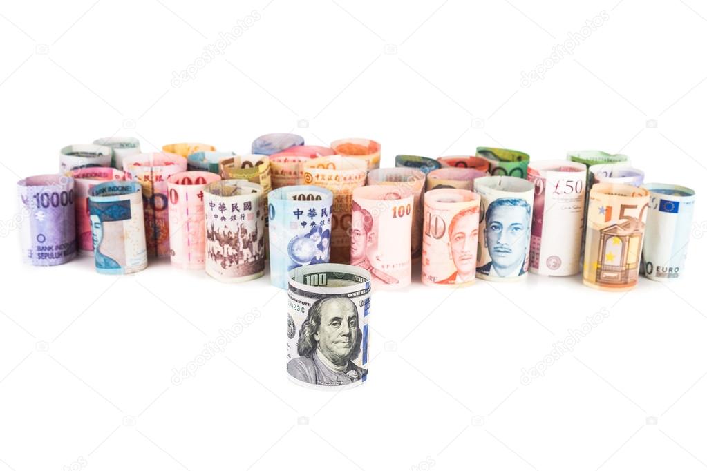 Pile of rolled-up currency notes with US Dollar in front