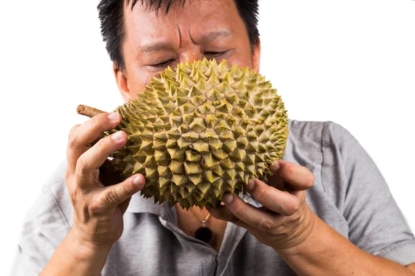 Άνθρωπος sniffs durian φρούτα για την αξιολόγηση της ποιότητάς — Φωτογραφία Αρχείου