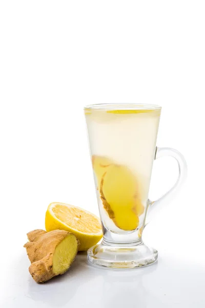 Stimulating Hot ginger and lemon tea in transparent glass — Stock Photo, Image