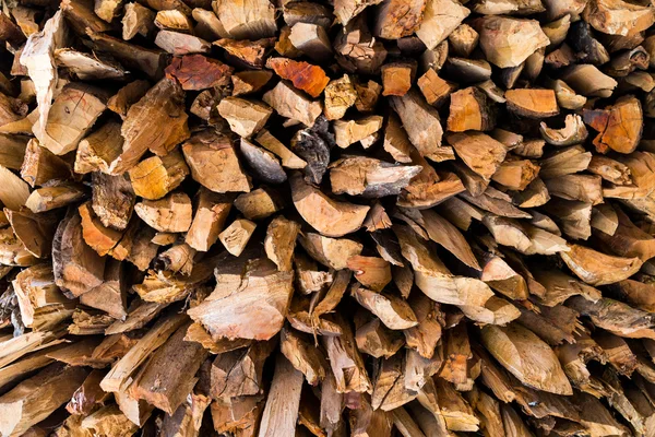 Pilha pilha de madeira picada fundo abstrato — Fotografia de Stock