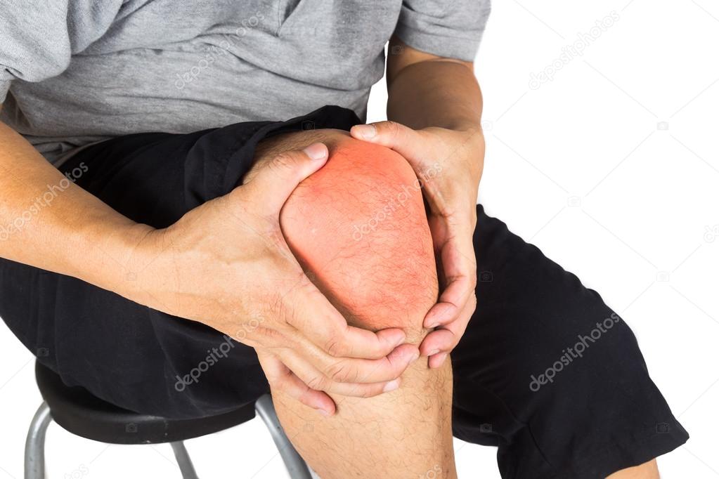 Close up on the painful knee joint of a matured man