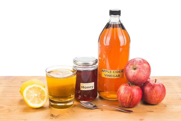 Яблучний оцет з медом та лимоном, природні засоби та c — стокове фото
